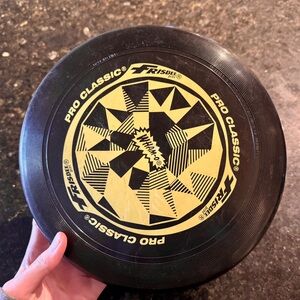 Black frisbee, wham-o frisbee